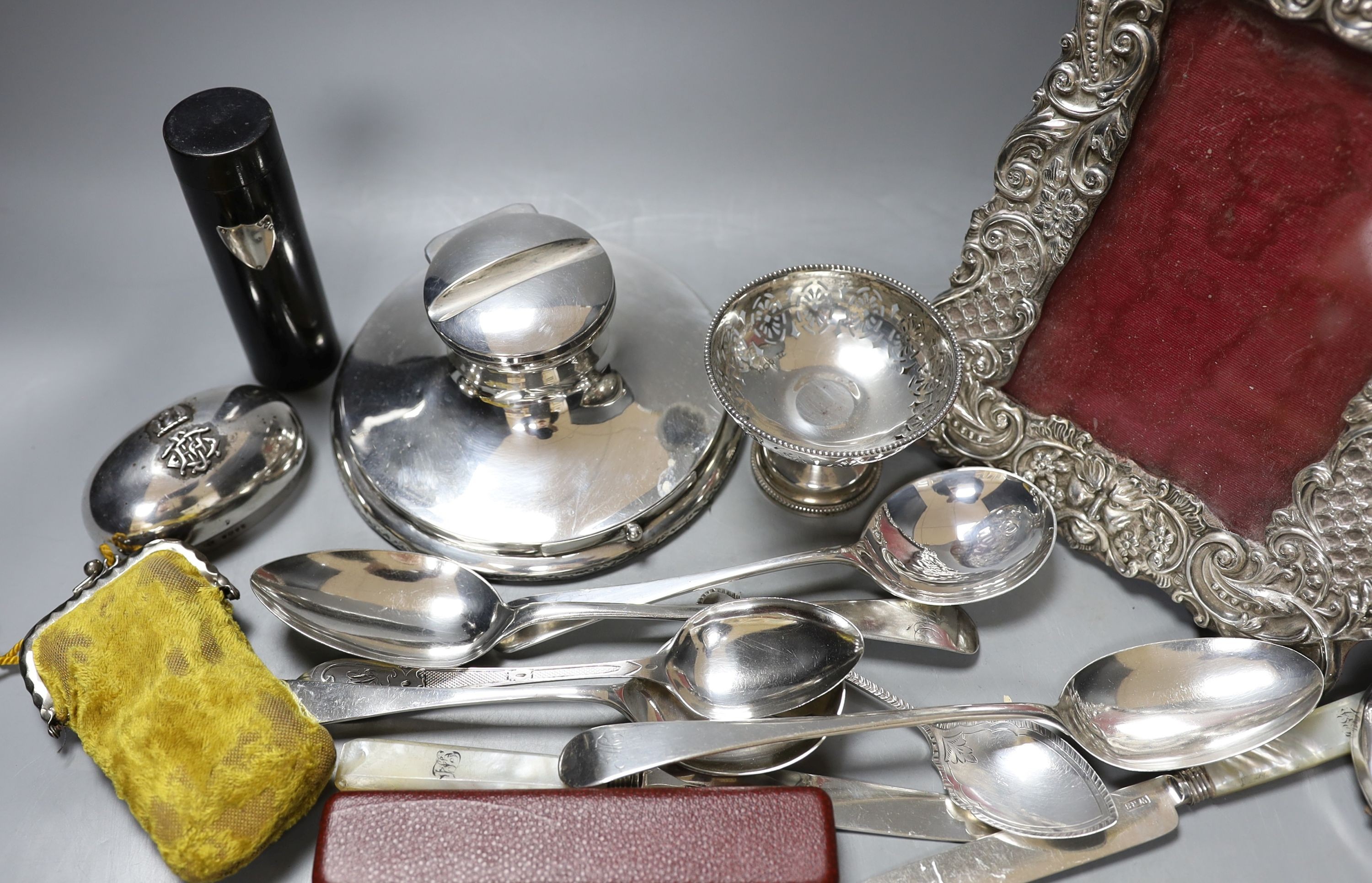 Assorted small silver including a photograph frame, flatware, inkwell and small pedestal dish, etc.